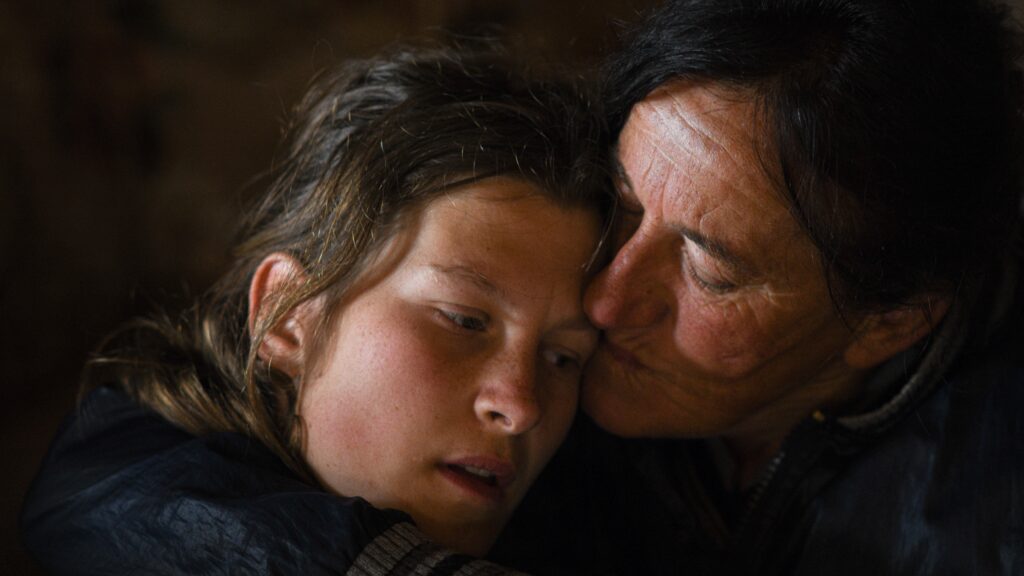 Still 3 Gara Nada hug TO HOLD A MOUNTAIN European Films Head To Sundance for the Last Splash in Park City